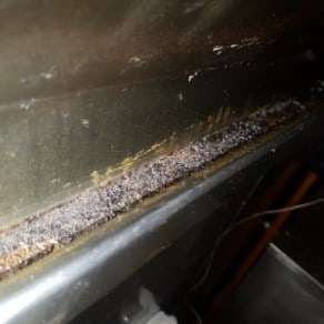 dirty kitchen exhaust hood tracks